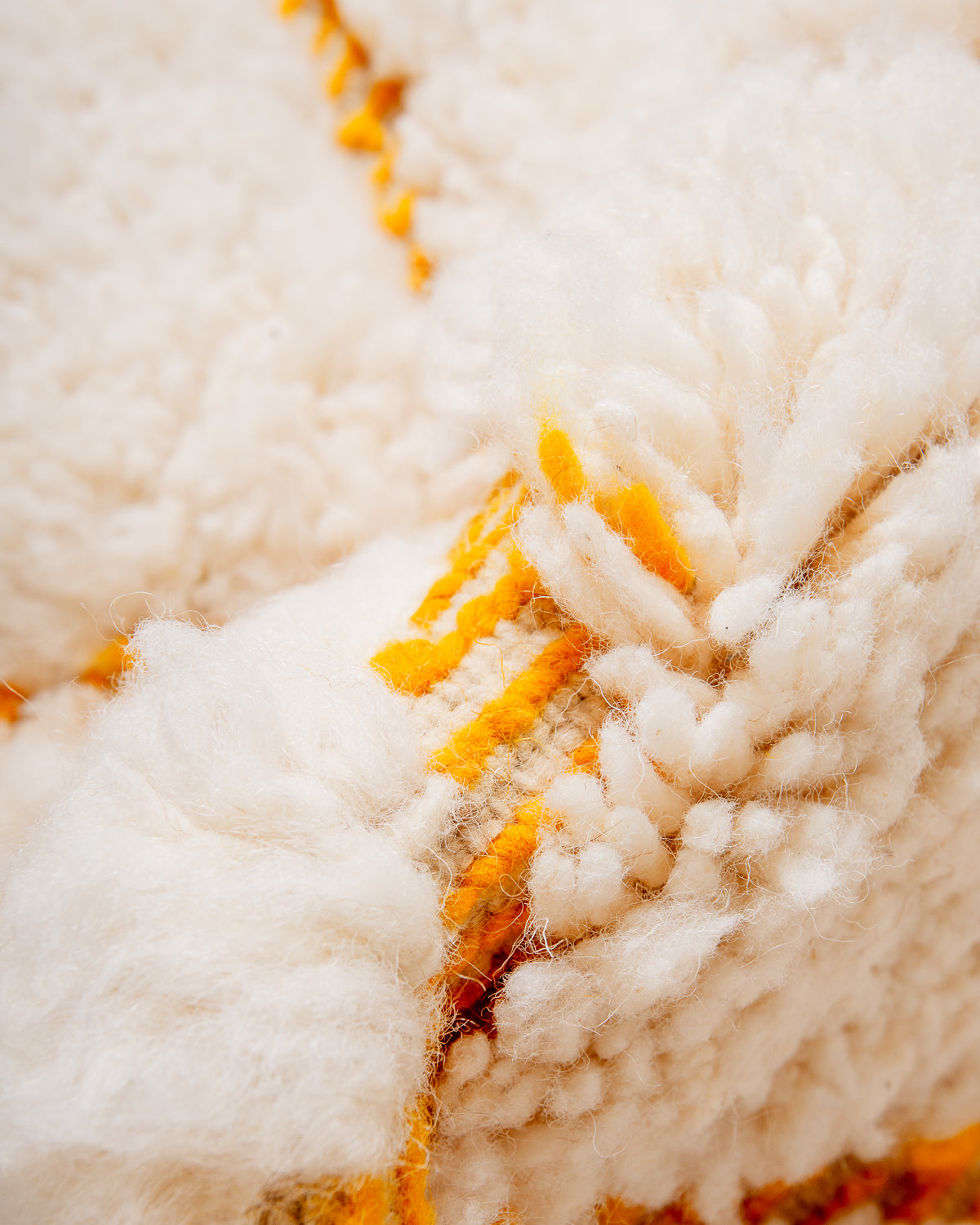 Modern, designer, handcrafted Berber rug from Morocco. Beniourain carpet with beautiful colours and patterns and fluffy wool texture.